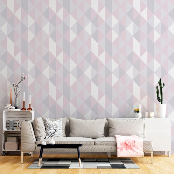 Papel de parede cores suaves em padrões geométricos na sala
