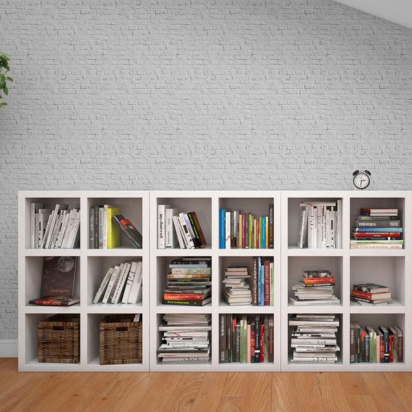 Papel de parede adesivo tijolo cinza e estante de livros